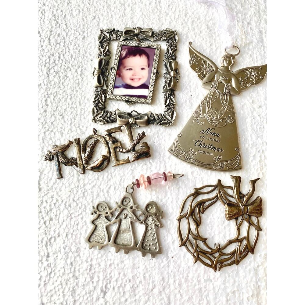 vintage-style metal holiday decorations features silver-toned pewter ornaments